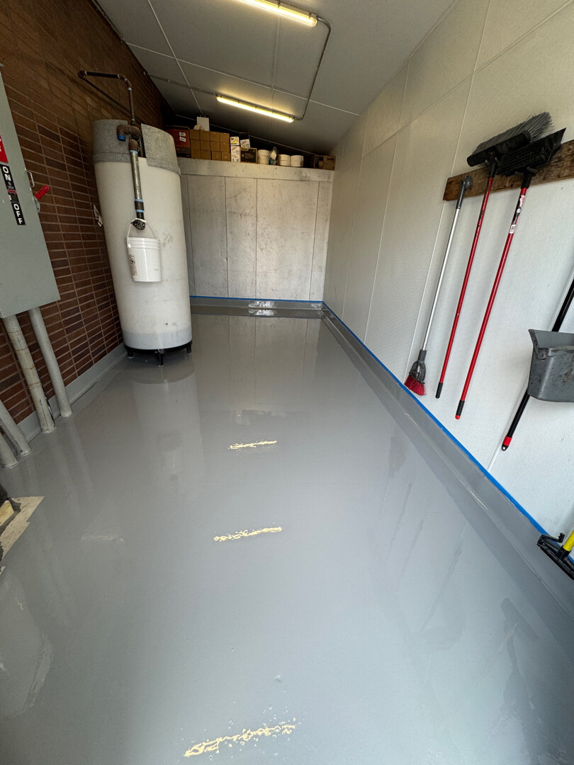 Sealed pump room floor and integrated cove base in restaurant kitchen ready to pass health inspection