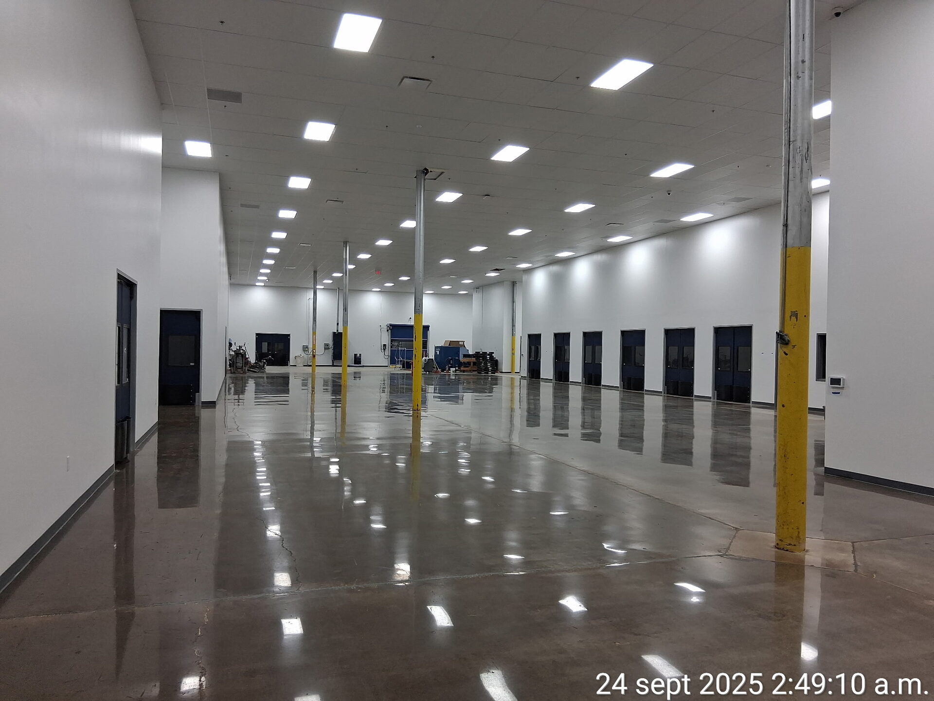 Close-up of polished concrete surface in pharmaceutical plant showing densified, mirror-grade 800-grit finish