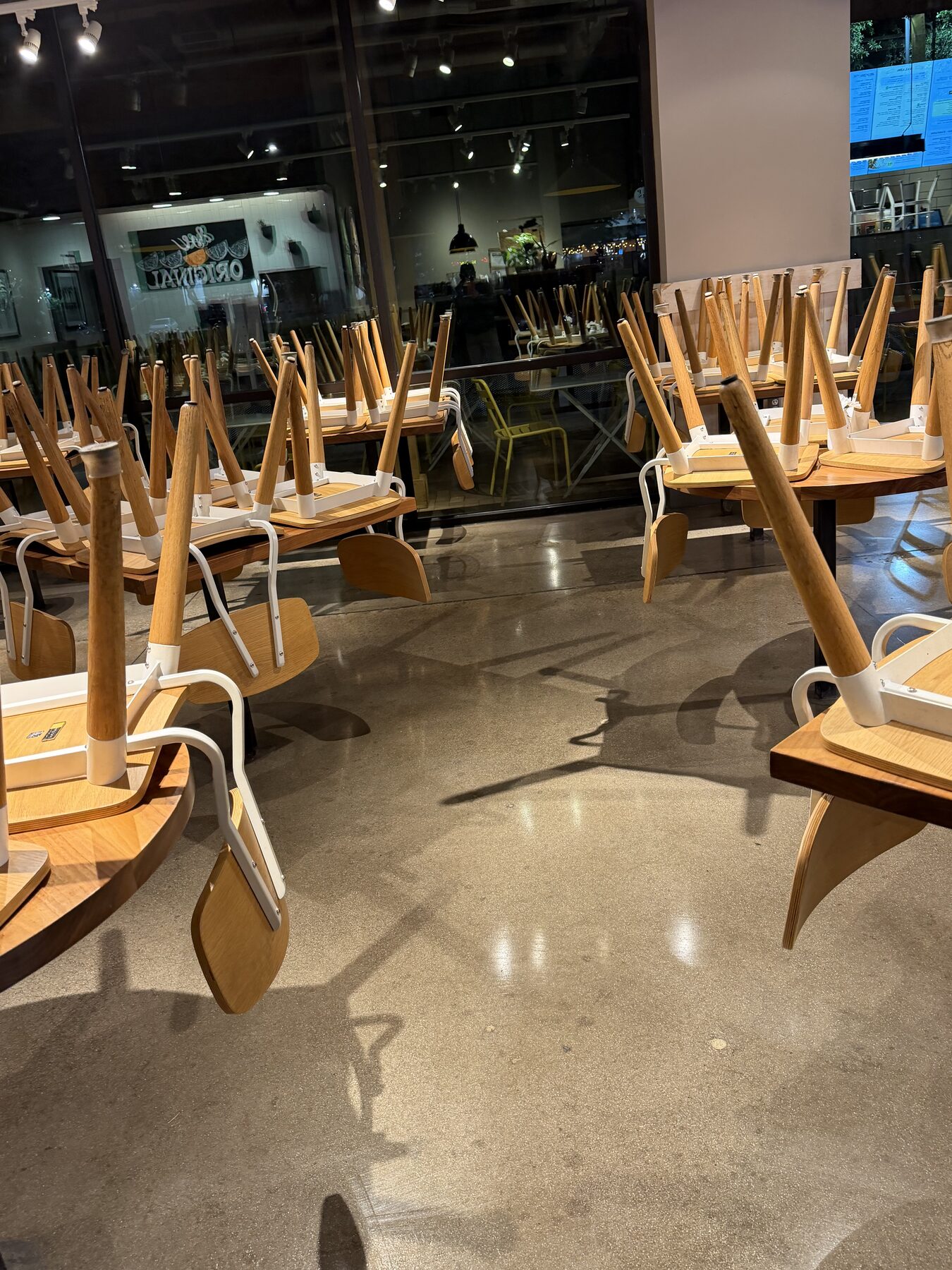 Final after photo of resealed concrete restaurant floor, ready for next-day service