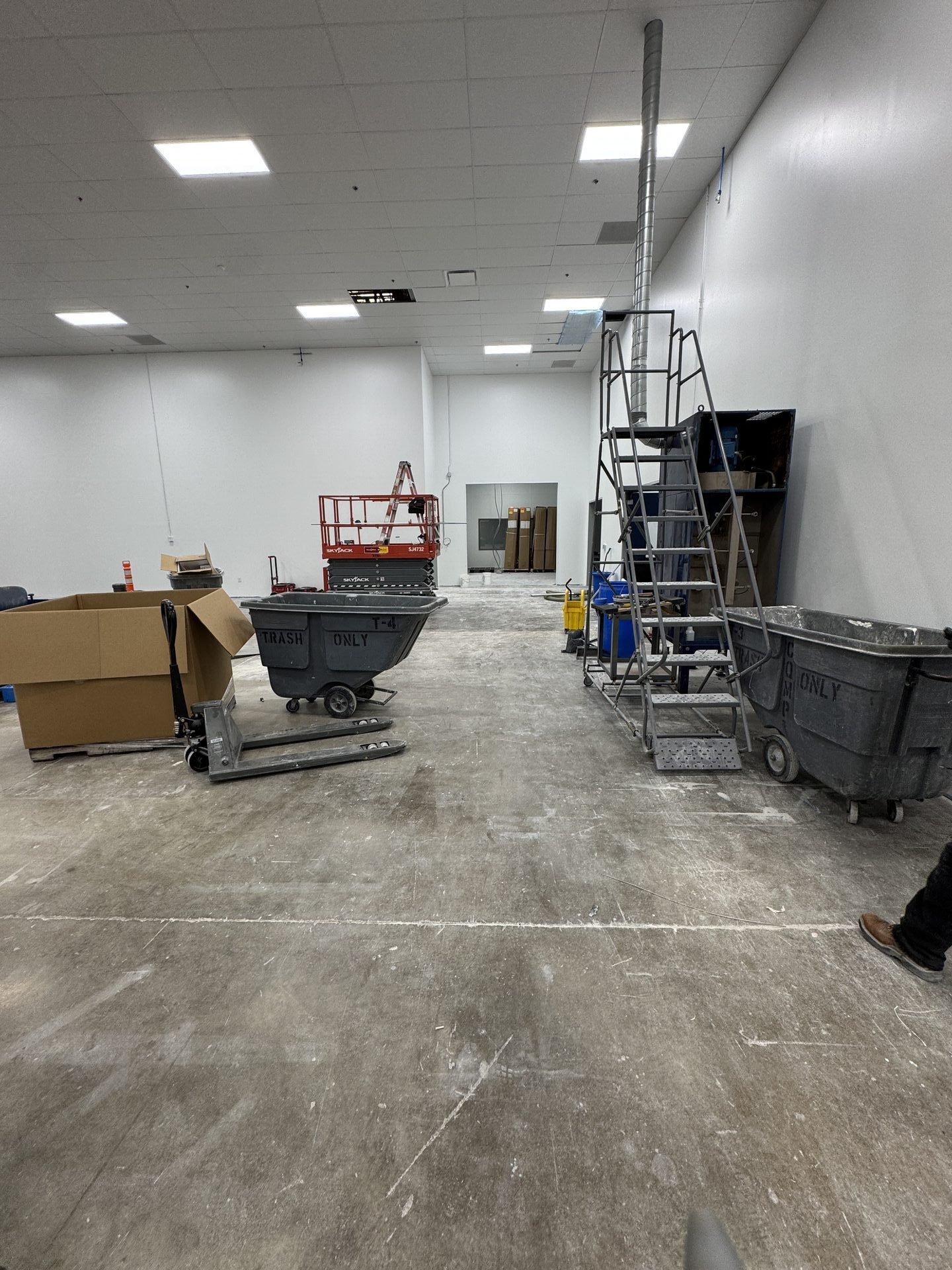 Wide structural crack running through pharmaceutical plant concrete floor before polyurea repair