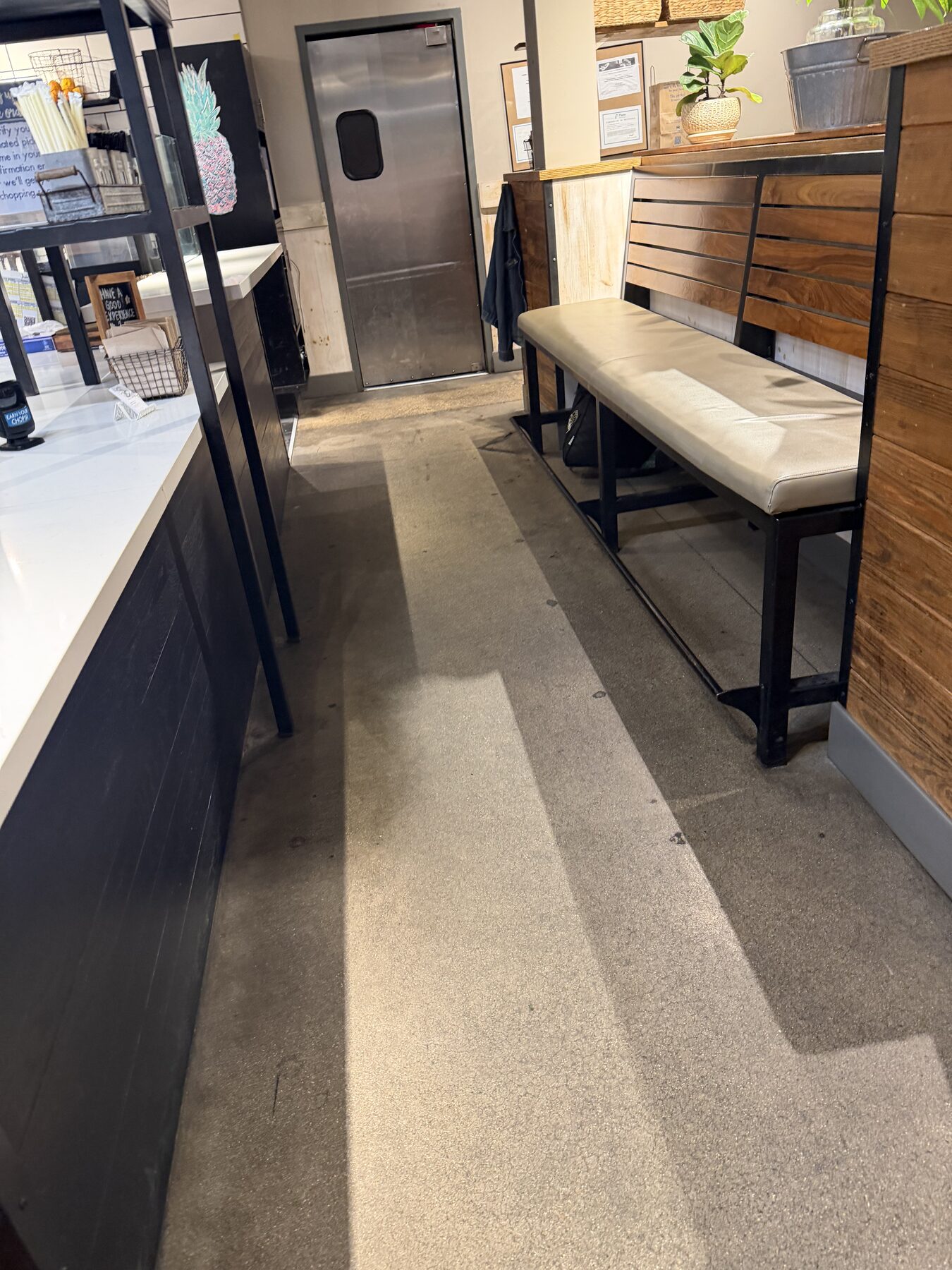 Hot-water extraction deep cleaning concrete floor in restaurant overnight
