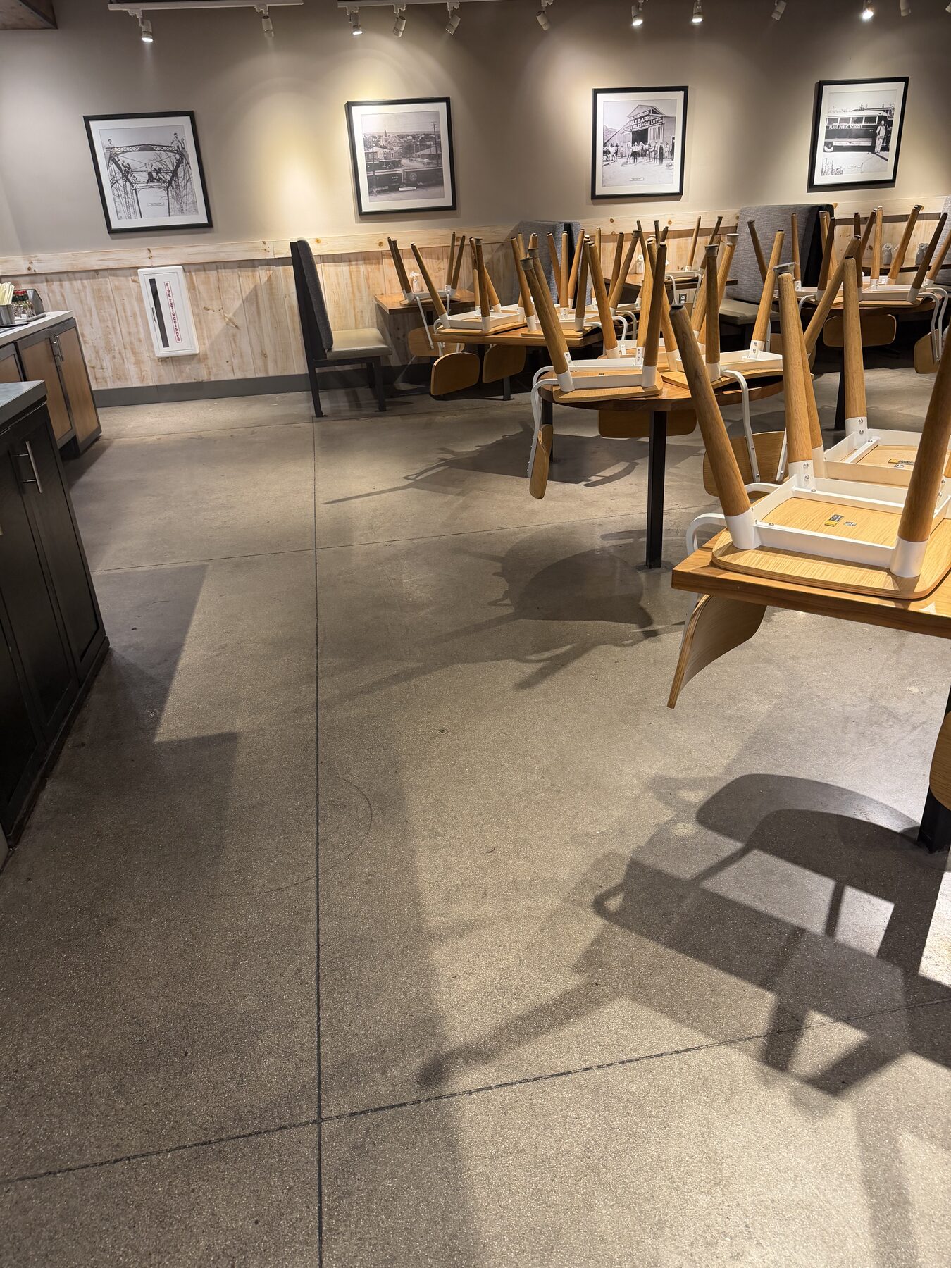 Commercial degreasing of concrete slab to remove embedded grease before resealing