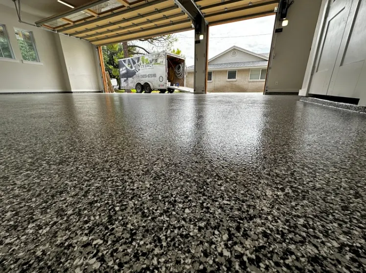 Garage with beautiful speckled epoxy floor coating