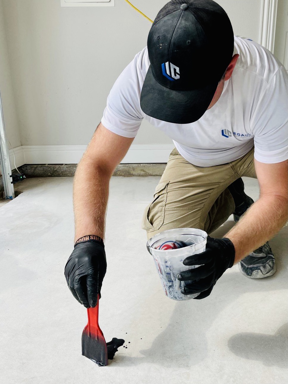 Legacy professional applying premium floor coating with precision and care