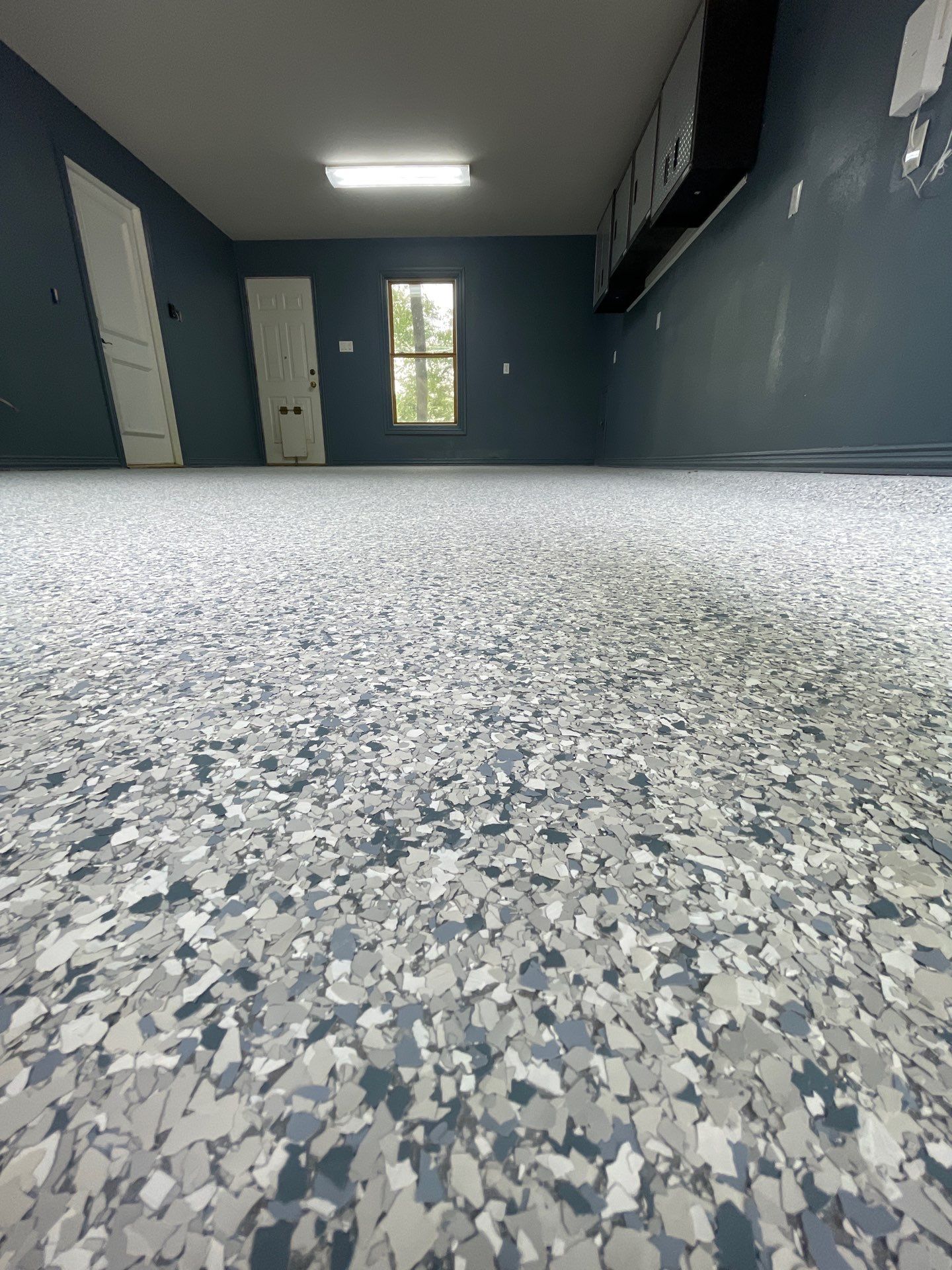 After garage floor transformation with flake coating