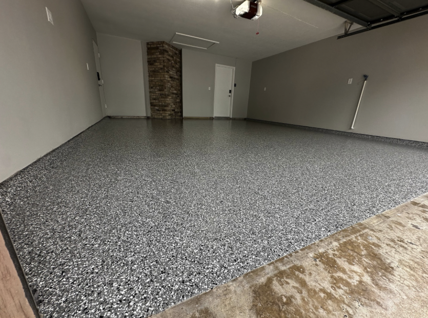 Large garage with premium speckled epoxy coating