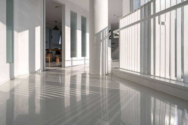 Polished concrete floor in modern commercial space with reflective finish